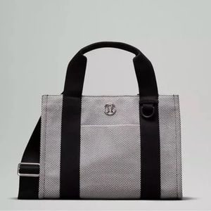 Lululemon 2 Tone Canvas Tote. Anchor/Light Ivory. Mini with strap/crossbody.